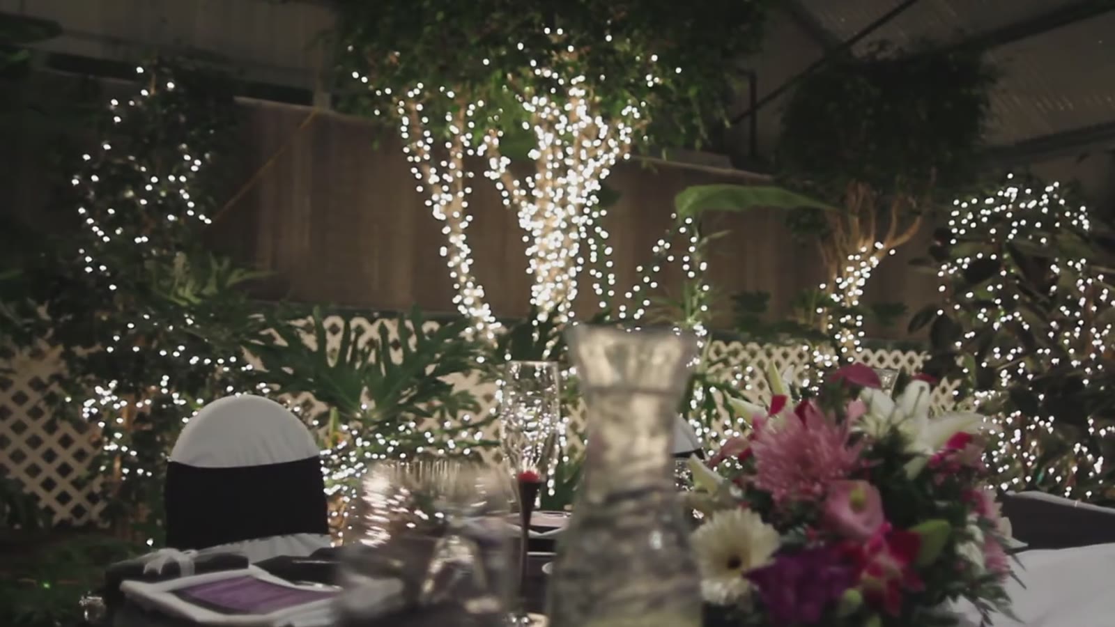Garden Room tables set among the plants and lights